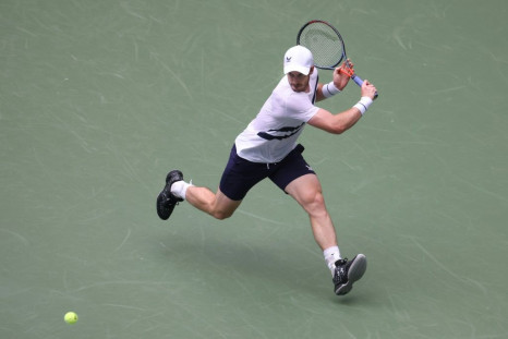 Andy Murray returns the ball during his first round match against Yoshihito Nishioka on day two of the 2020 US Open