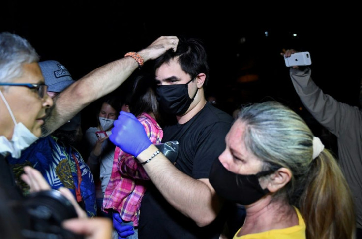 Political activist Jose Daniel Hernandez leaves the National Intelligence Service headquarters after being pardoned by Venezuela President Nicolas Maduro