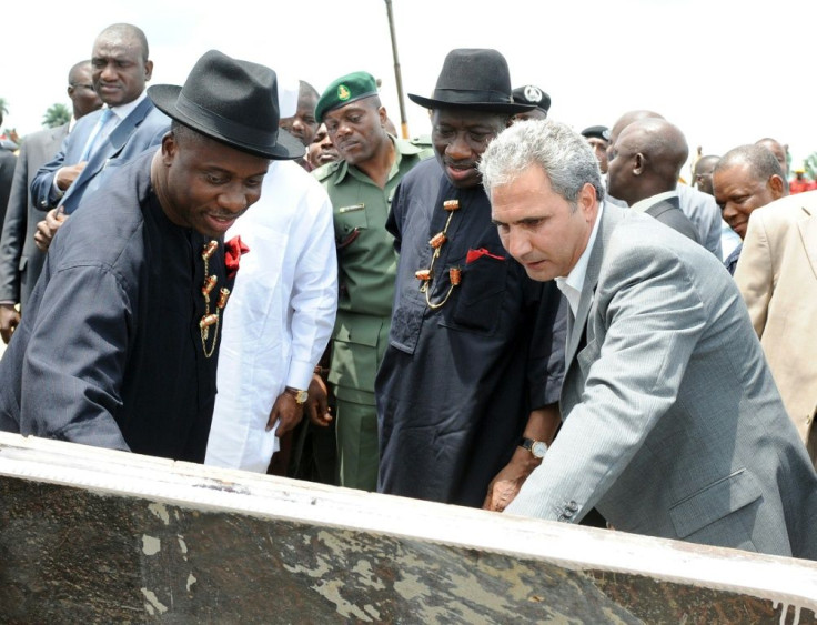 The cousin of former president Goodluck Jonathan (C) won a contract to build an eight-kilometre road that was never completed