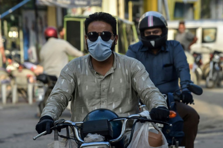 Masks have become an increasingly rare sight on the streets of Pakistan, spurring warnings from experts for the public to remain vigilant over Covid-19