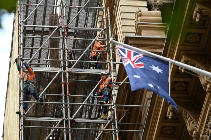 The economy contracted seven percent in April-June from the previous three months, in line with government forecasts, the Australian Bureau of Statistics said
