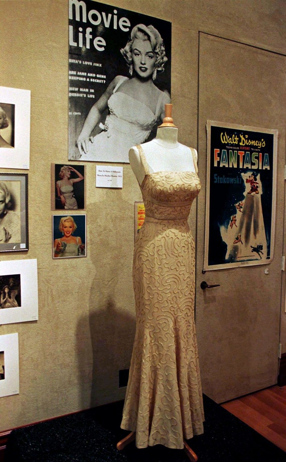 Actress Marilyn Monroes evening gown, which she wore in the 1953 film quotHow To Marry A Millionaire.