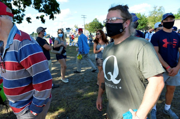 This man wearing a QAnon shirt joined a rally held by President Donald Trump in New Hampshire