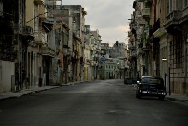 A street in Havana is deserted as a curfew, imposed to halt a spike in coronavirus infections, goes into force on September 1