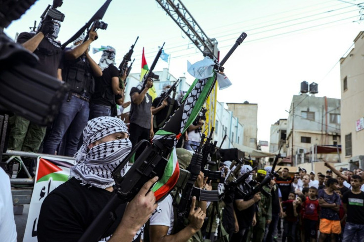 In Nablus in the occupied West Bank, armed members of the Fatah movement rallied against the US-brokered UAE-Israel deal