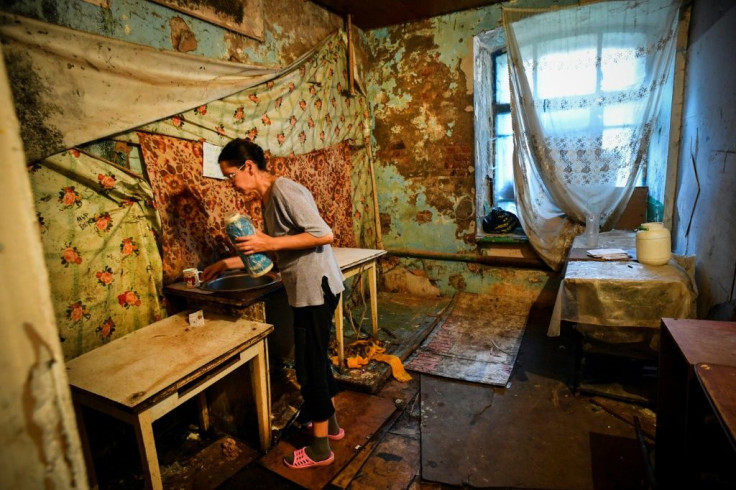 Originally designed as model housing for workers, a century later, the Proletarka's impoverished residents live in squalor