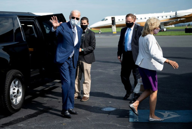 Democratic US presidential candidate Joe Biden, with his wife Dr Jill Biden waves as he boards his plane in Delaware bound for Kenosha Wisconsin, the protest-hit city that President Donald Trump visisted two days earlier