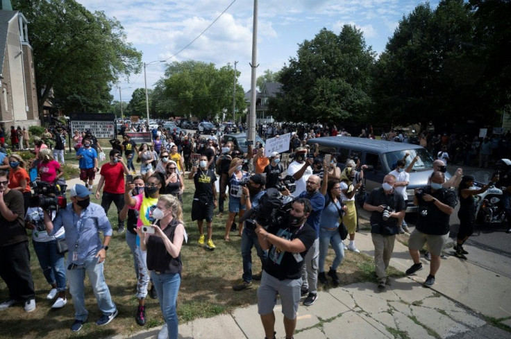 A crowd gathered outside Grace Lutheran Church in Kenosha, Wisconsin on September 3, 2020, as Democratic presidential candidate Joe Biden joined a round table with community leaders to discuss recent racially charged protests and a path forward