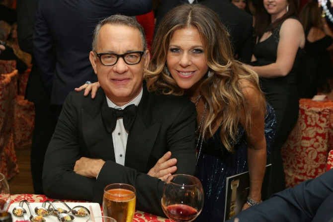 Tom Hanks and Rita Wilson, pictured in 2014, are among a number of Hollywood stars to have contracted Covid-19