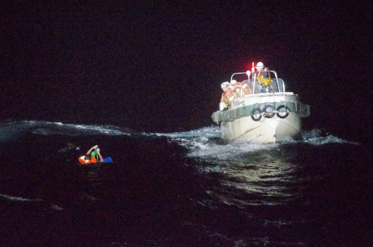 Dramatic photos released by Japan's coast guard showed the rescue of one survivor from a ship that sank during a typhoon