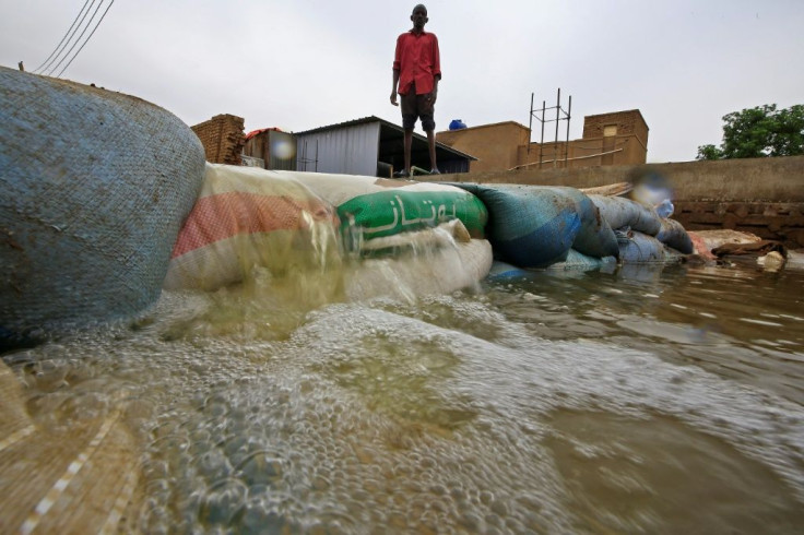 People have built barricades by filling bags with sand but the floods have broken through, destroying homes and property