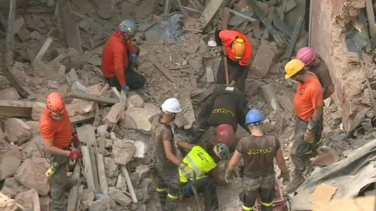 IMAGES Rescue workers dig through rubble in a wrecked district of Lebanon's capital Beirut in search of possible survivors from a mega-blast at the adjacent port one month ago, after scanners detected a pulse.