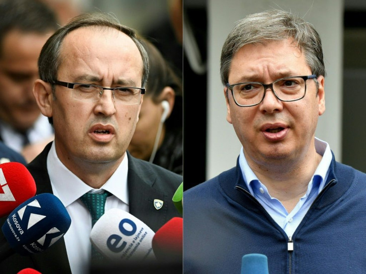 Newly elected Kosovo Prime Minister Avdullah Hoti (L) and Serbian President Aleksandar Vucic (R) are expected to sign agreements on opening economic relations after a day of talks in Washington