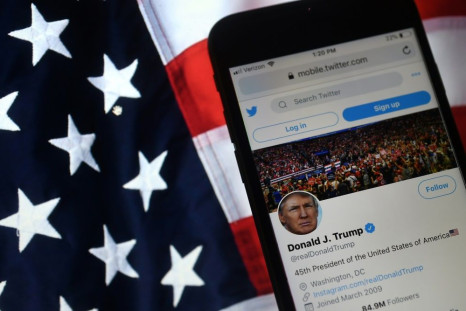 Twitter has removed or labeled several tweets by President Donald Trump, whose account is shown on a mobile phone in this photo illustration
