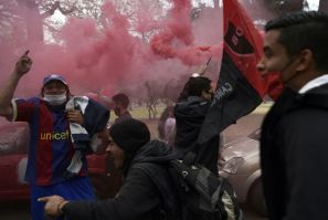 Newell's Old Boys supporters gather outside Marcelo Bielsa stadium before their vehicle parade to appeal to Argentine footballer Lionel Messi to come play for his boyhood team