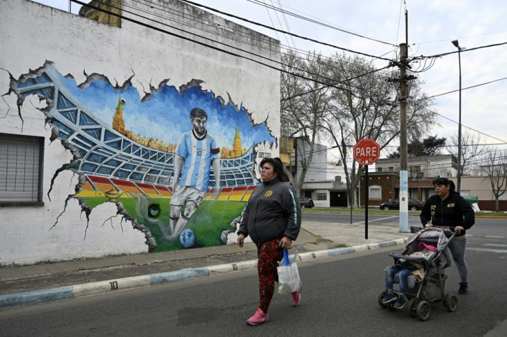 A mural of Lionel Messi is seen on a wall near the star's childhood home in Rosario, Santa Fe Province, some 350 km north of Buenos Aires