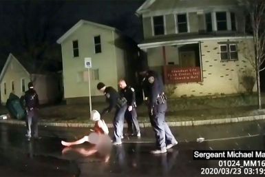 This image taken from police bodycam video released by the Rochester, New York, Police Department, shows police arresting Daniel Prude on March 23, 2020 after putting a hood on his head