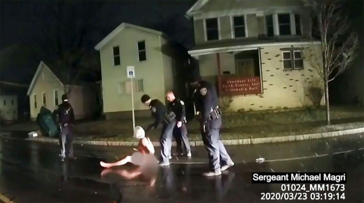 This image taken from police bodycam video released by the Rochester, New York, Police Department, shows police arresting Daniel Prude on March 23, 2020 after putting a hood on his head