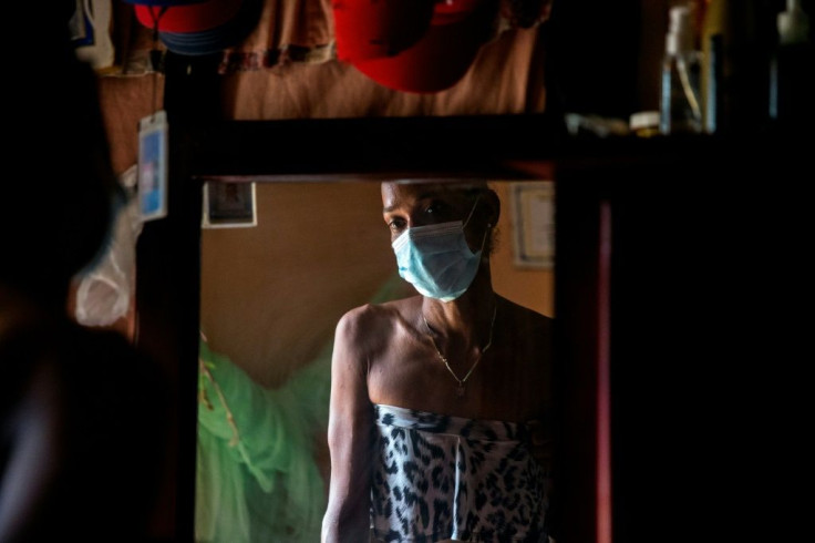 Yohana Espinoza, an HIV-positive transgender prostitute in the Dominican Republic, is seen in her Santo Domingo apartment on August 14, 2020