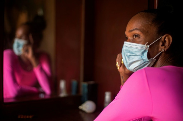 Many Dominican sex workers like Yohana Espinoza, seen here in her Santo Domingo flat, have had to depend on help from the government and charities