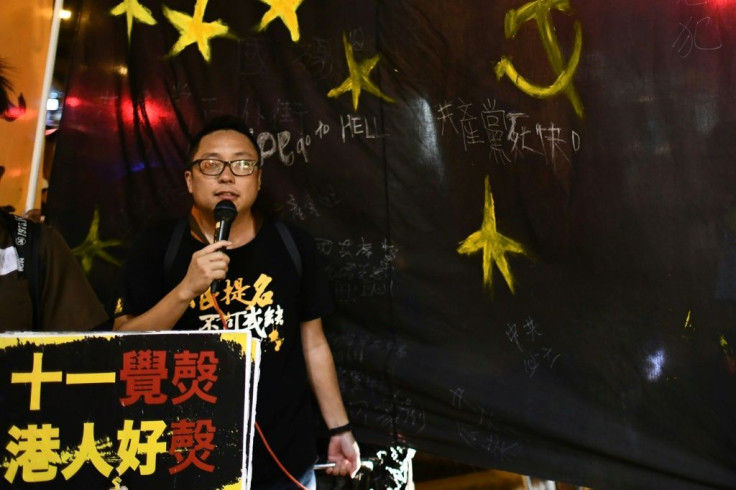 Tam, a former radio presenter known "Fast Beat", was arrested at his home in north east Hong Kong