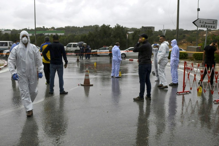 Tunisian forensic police investigate the site of the deadly attack on a patrol of National Guard officers in Sousse, south of the capital Tunis