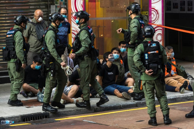 Police arrested nearly 100 people in Hong Kong who were protesting against the cancellation of local elections