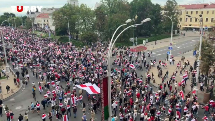 At least tens of thousands and possibly more Belarusian protesters stage a peaceful march in the capital Minsk, keeping the pressure on strongman Alexander Lukashenko who has refused to quit after his disputed re-election, turning instead to Russia for he