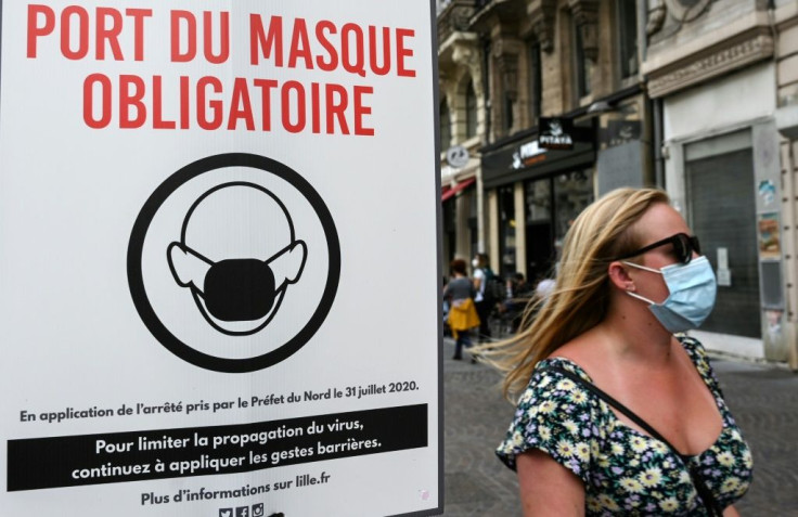 A sign warns passersby that masks are mandatory in Lille, northern France in August 2020