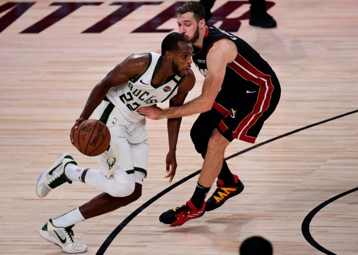 Milwaukee's Khris Middleton drives the to the basket in the Bucks' 118-115 overtime win over the Miami Heat in game four of their NBA playoff series