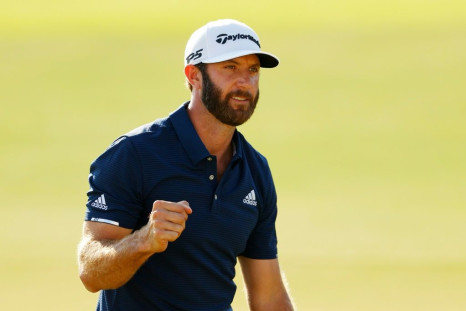 World number one Dustin Johnson celebrates on the 18th green after winning the US PGA Tour Championship and the $15 million FedEx Cup playoff crown