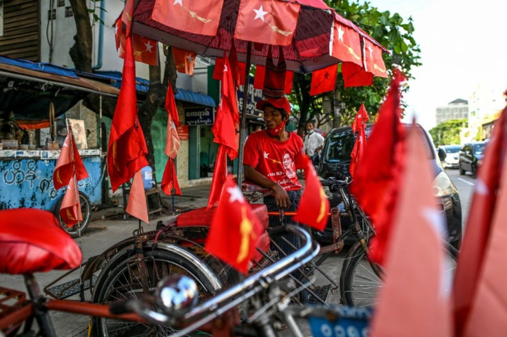 Zaw Min's Yangon trishaw is festooned with the National League for Democracy party's flags