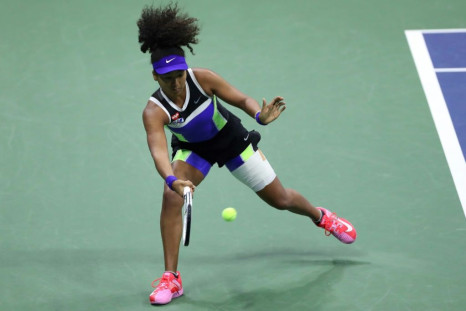Naomi Osaka of Japan returns a volley during her quarter-finals match against Shelby Rogers of the United States at the 2020 US Open