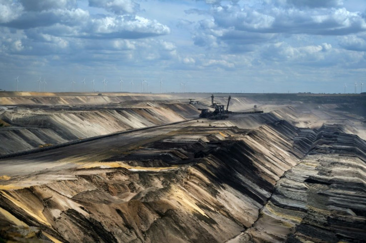 Protesters argue that the demolition of villages to enlarge the Garzweiler II brown coal mine in North Rhine-Westphalia state violates locals' constitutional rights and is at odds with the government's pledge to ditch the polluting fossil fuel