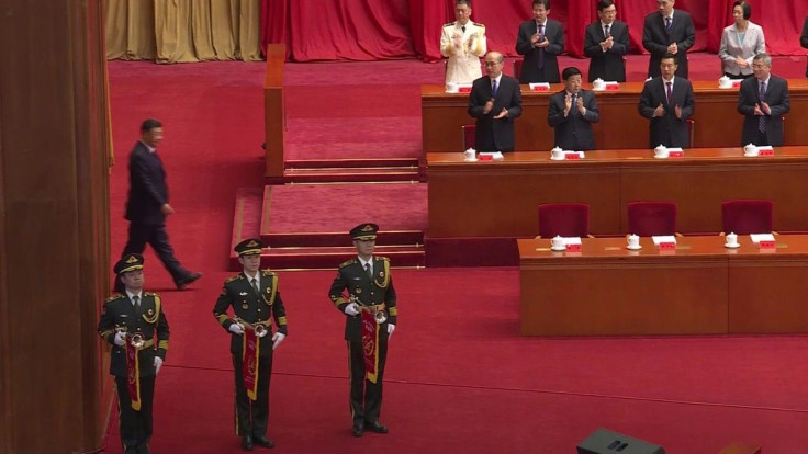 Chinese President Xi Jinping praises the country's achievements against the Covid-19 pandemic and warns it is still around and that no country can be safe "alone" against the virus