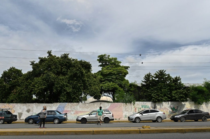 Drivers queue to refuel their vehicles in Maracay, in north-central Venezuela, in August 2020