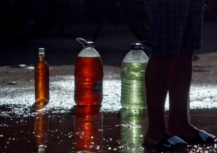 Gasoline by the bottle on sale on a street in Maracaibo, capital of Venezuela's Zulia State, in August 2020