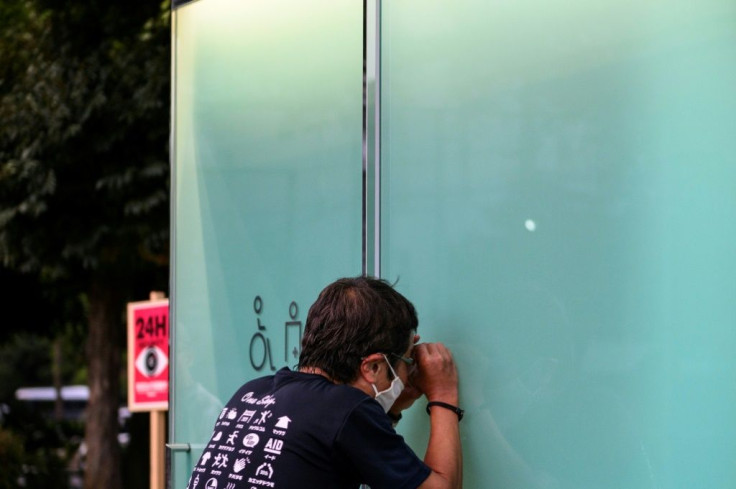 When the door is locked, the walls of the toilet turn opaque, offering the user privacy