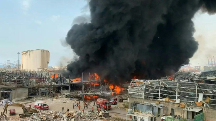 Gigantic plumes of thick black smoke billow from a huge fire that erupted at Beirut port, weeks after a deadly blast caused by hundreds of tonnes of ammonium nitrate ripped through the capital