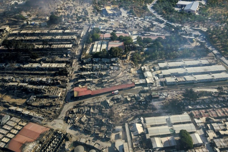 The fires destroyed the camp and the surrounding informal tent area that housed roughly 12,000 people