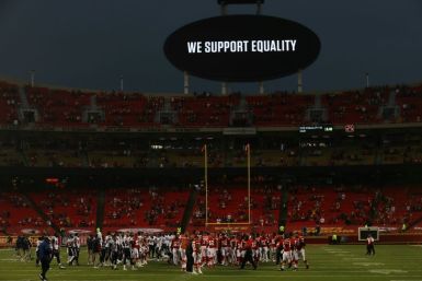 Kansas City Chiefs and Houston Texans players line up for a moment of unity ahead of their season-opening NFL game