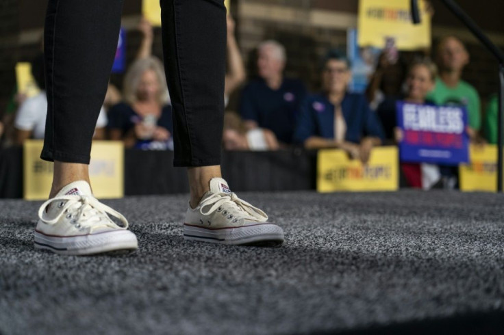 Kamala Harris's love for Converse sneakers goes back years -- here she is wearing them in Iowa in 2019