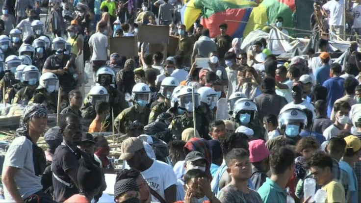 IMAGESHundreds of migrants descend on the streets of Lesbos to demonstrate against plans to move them to a replacement camp after they were left without shelter following fires which devastated the Moria camp housing migrants.