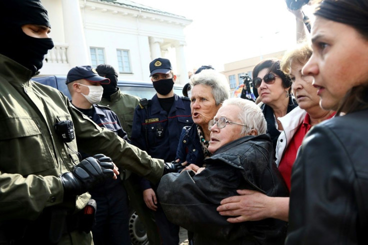 Riot police detained dozens of women during Saturday protests, a rights group said