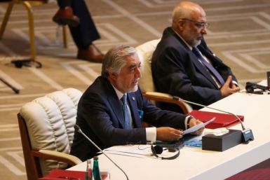 Abdullah Abdullah (L), Chairman of Afghanistan's High Council for National Reconciliation, called for an immediate humanitarian ceasefire at the start of historic peace talks with the Taliban in the Qatari capital Doha
