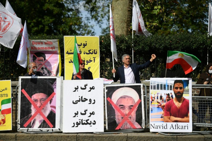 Protesters demonstrate outside the Iranian embassy in London on September 12, 2020 against the execution of Iranian wrestler Navid Afkari in the southern Iranian city of Shiraz and against the Iranian government