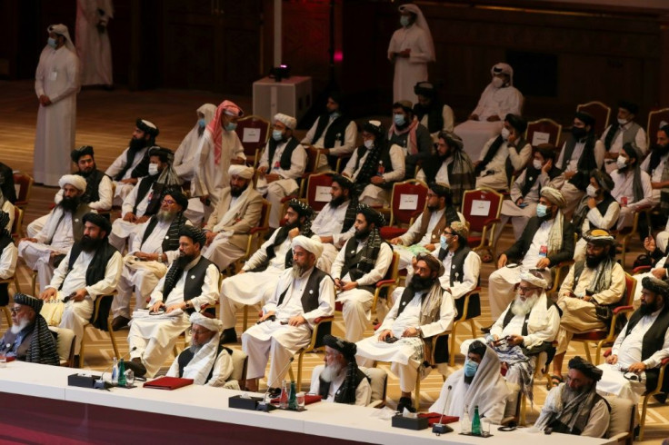 Members of the Taliban delegation at the opening of the negotiations, which are expected to be arduous and messy
