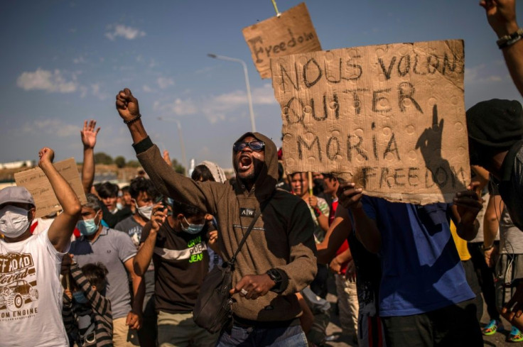 Protests by the migrants erupted on Lesbos on Saturday