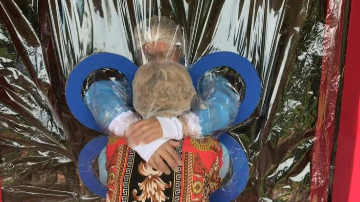 One Salvadorean nursing home offered plastic curtains to protect residents from virus infection while hugging