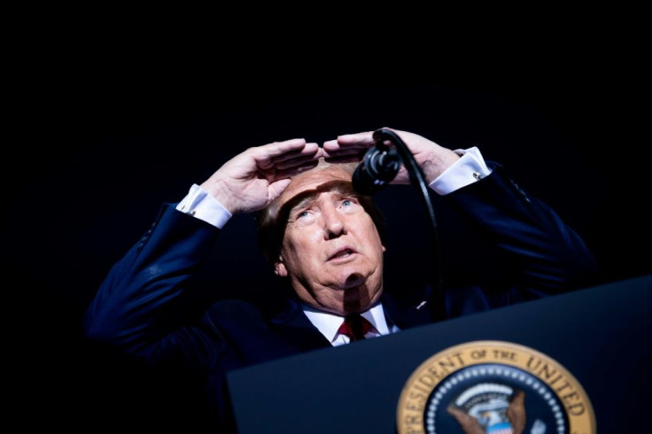 US President Donald Trump looks at the crowd during a campaign rally at the Minden-Tahoe airport in Minden, Nevada on September 12, 2020